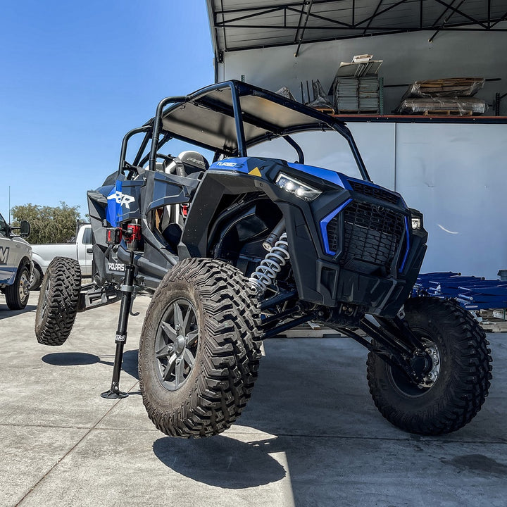 AGM Electric Jack lifting the side of a Polaris RZR Turbo S