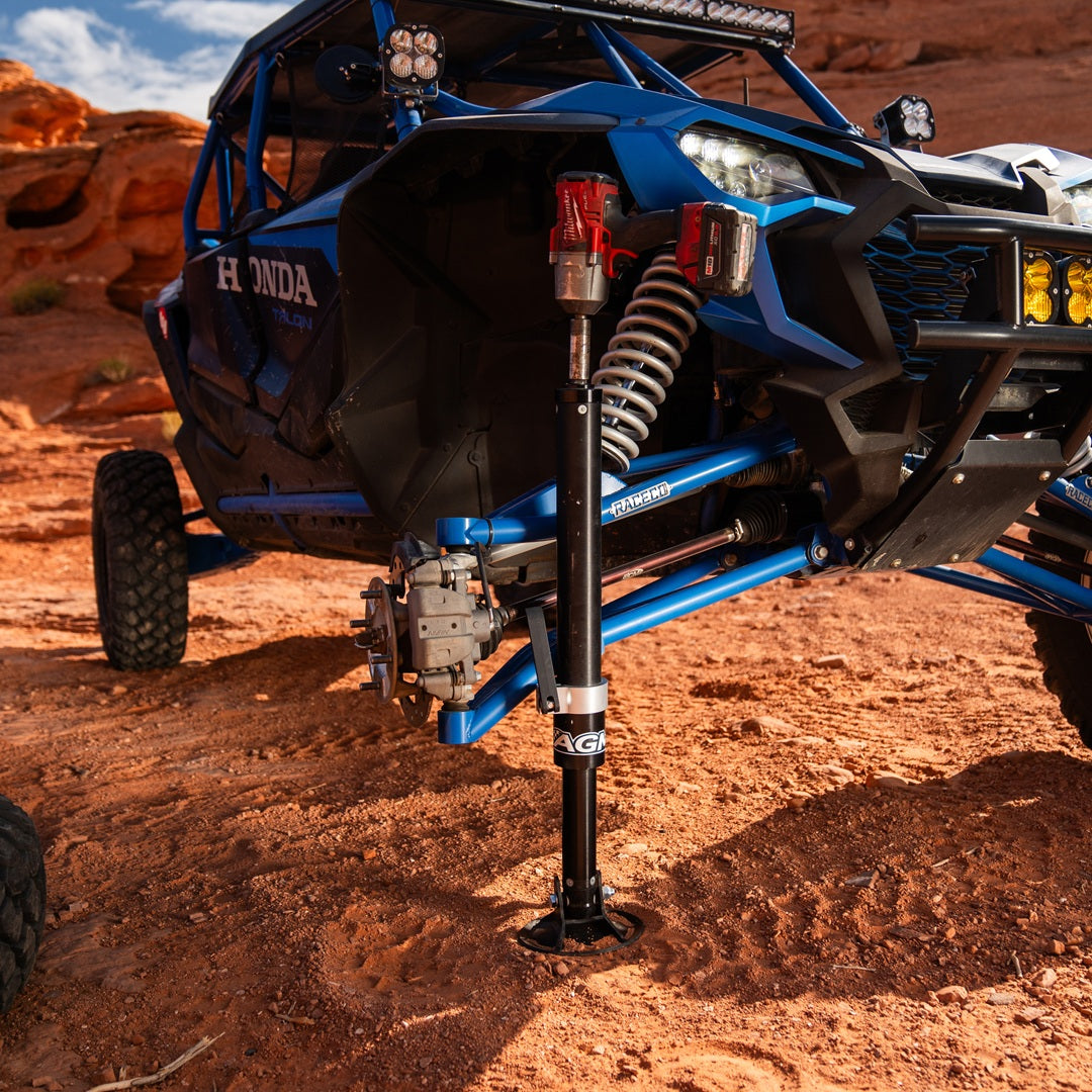 Blue Honda talon lifted by an AGM Manual Jack Pro in Utah